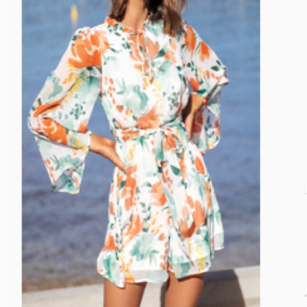 Romper from Cupshe—lightweight floral with liner.
